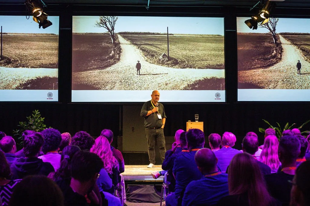 Steen Rasmussen speaking on stage